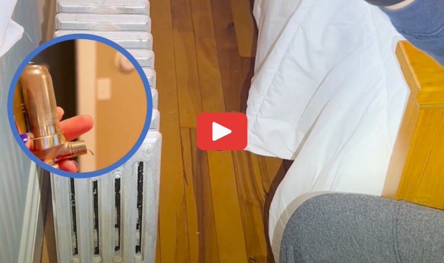 Close up image of an Air Rite Valve being replaced on a hissing steam radiator